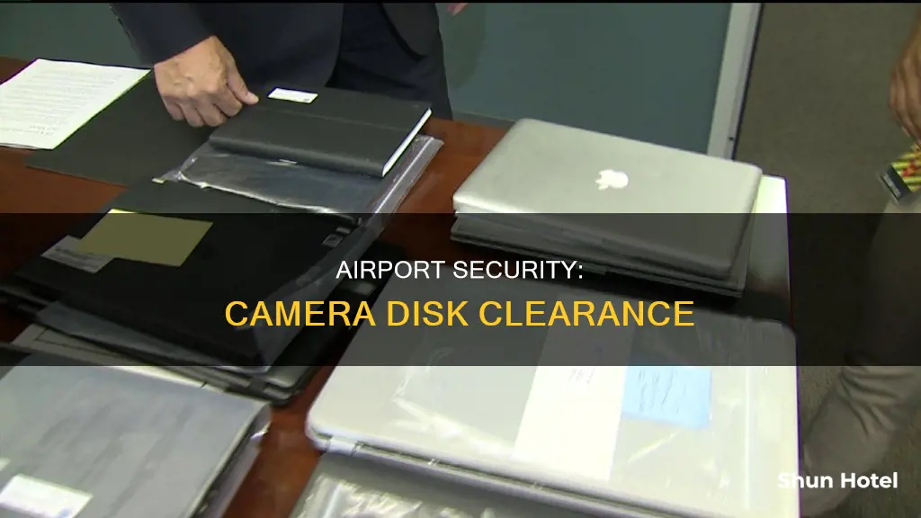 can camera disk go through airport security