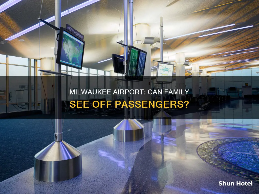 can family go to terminal with passengers at milwaukee airport