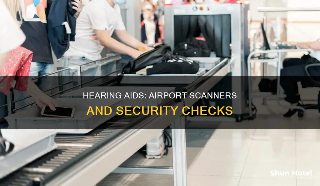can hearing aids go through airport scanners