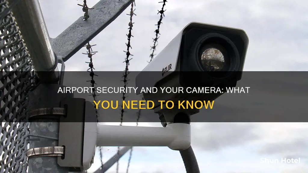 can i hold my camera through airport security
