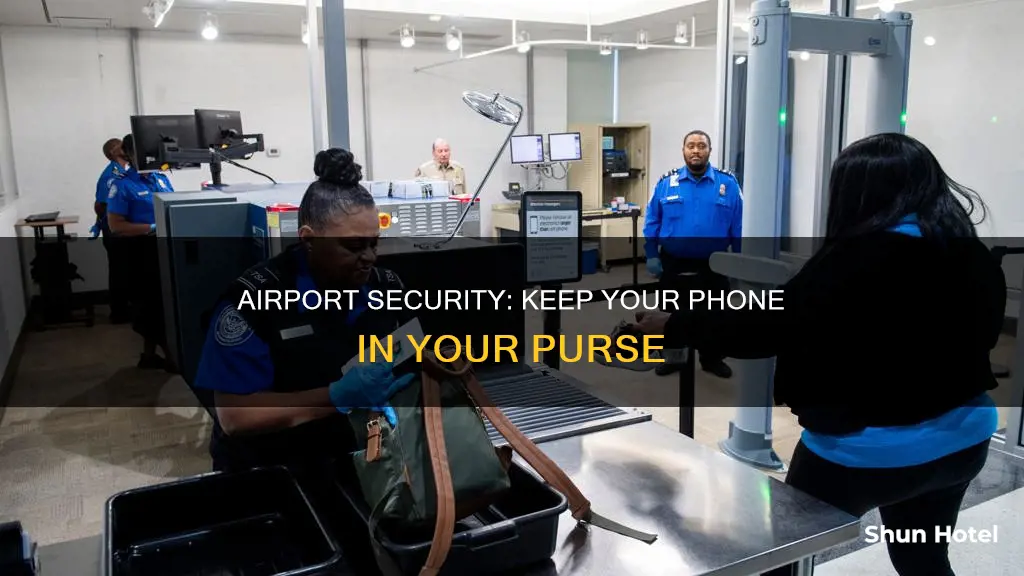 can i keep cell phone in purse through airport security
