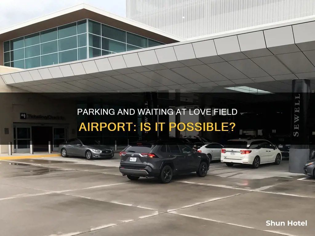 can i park and wait at love field airport