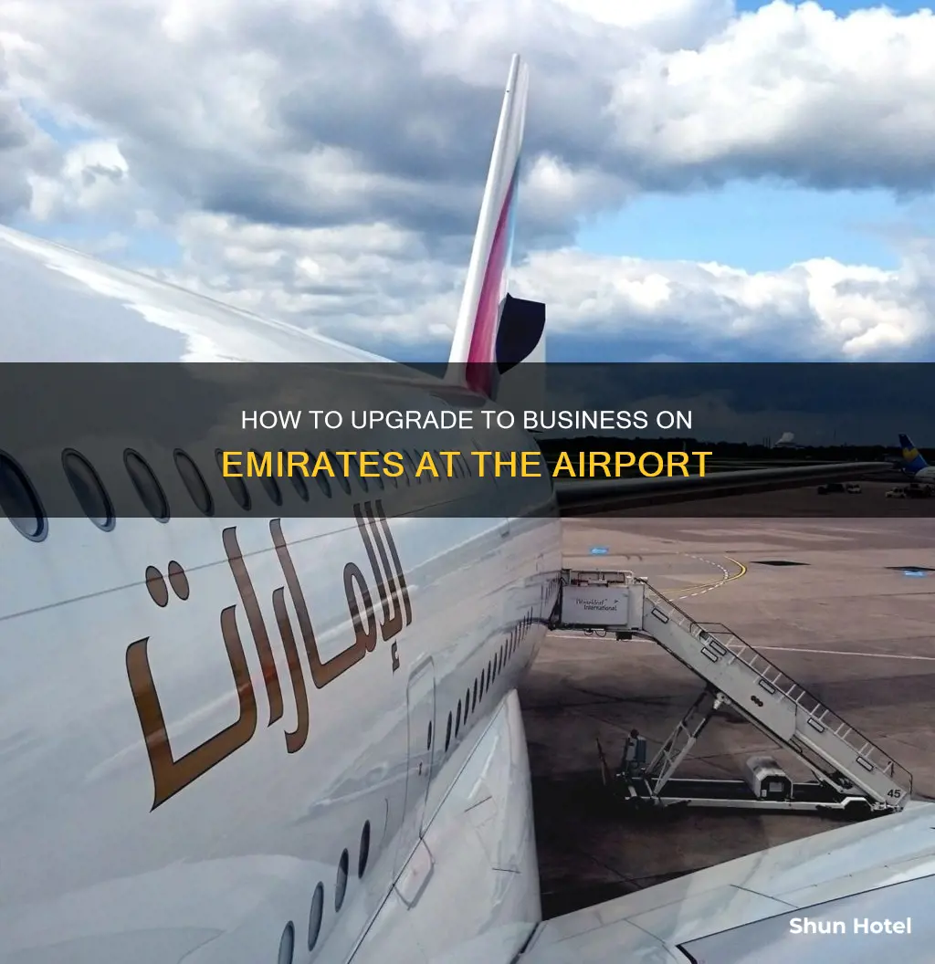 can i upgrade to business emirates at the airport