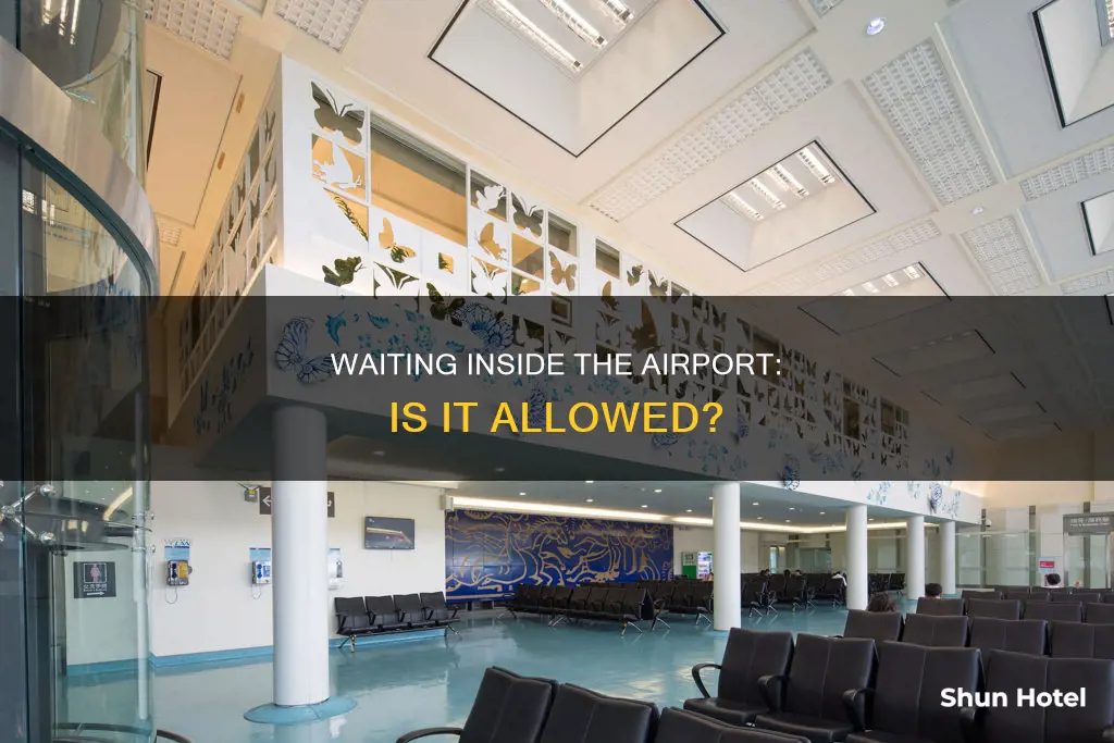 can i wait for someone inside the airport