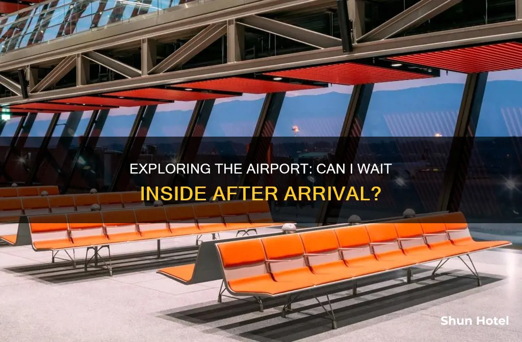 can i wait inside airport after arrival