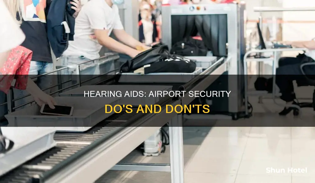 can i wear my hearing aids through airport security