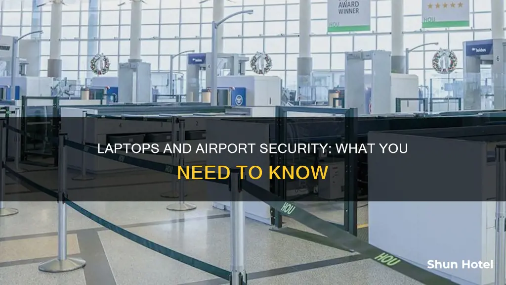 can laptops go through airport security