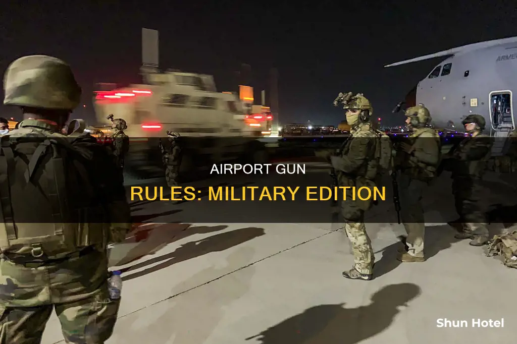 can military carry gun on airport property
