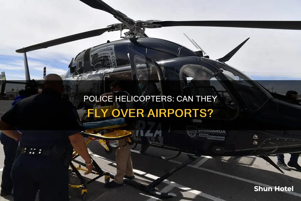 can police helicopters fly over airports