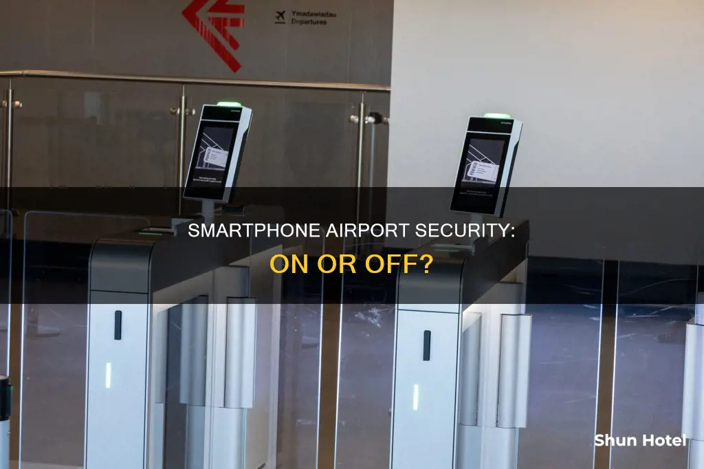 can smartphones be left o when going through airport scanners