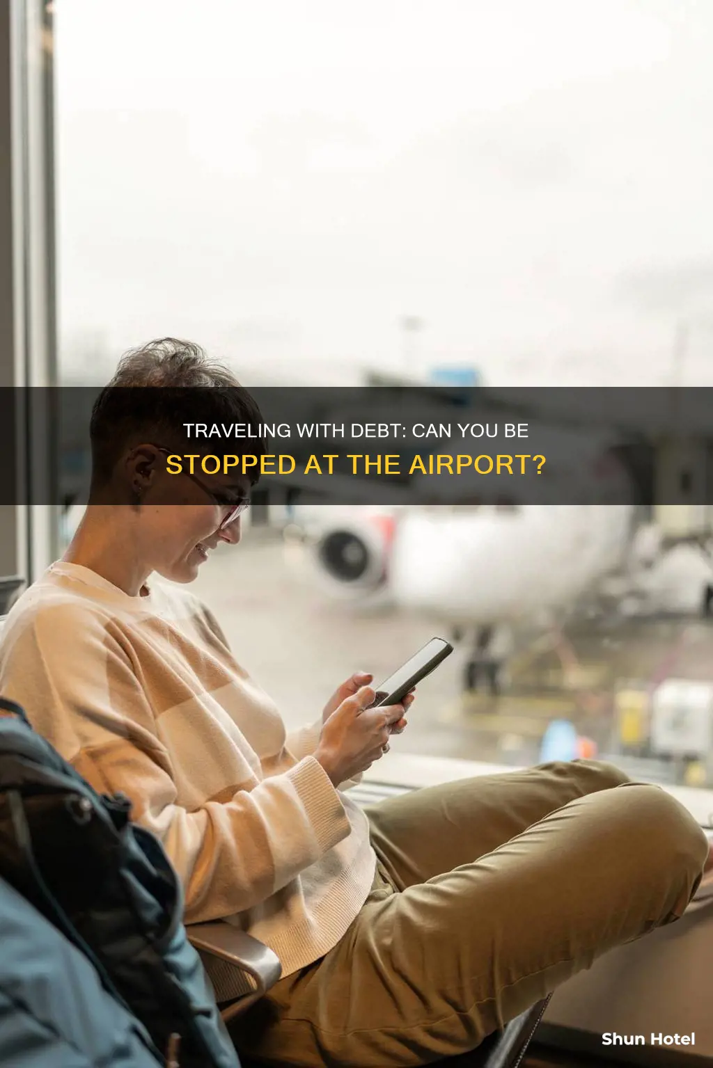 can you be stopped at airport for debt