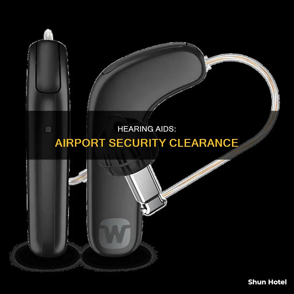 can you go through airport security with hearing aids