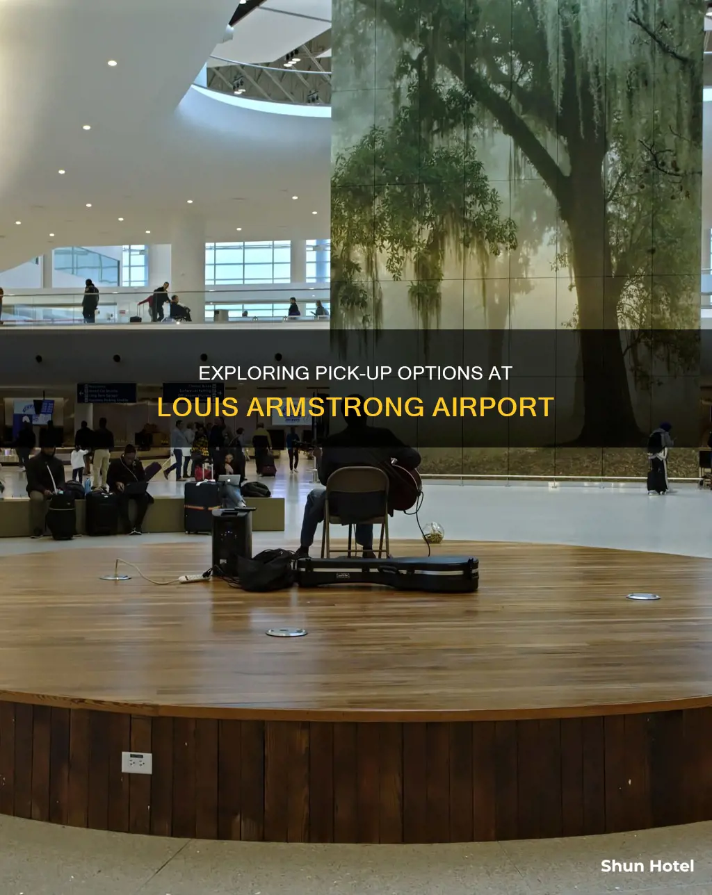 can you pick up a person at louis armstrong airport