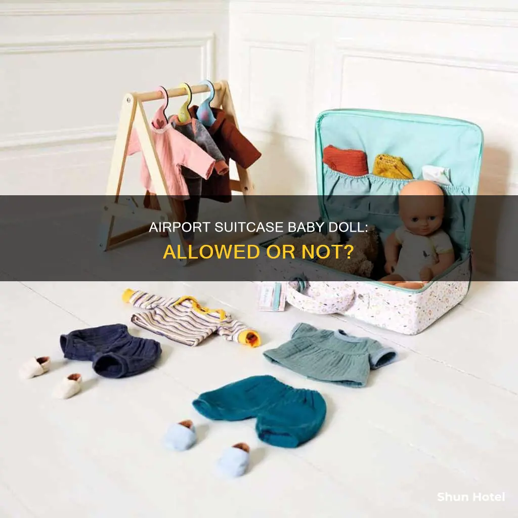 can you put a babay doll in a suitcase airport