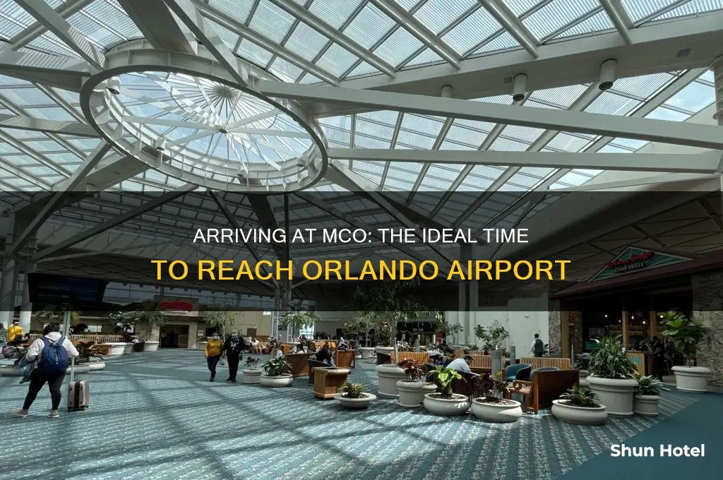 how early should i get to mco airport