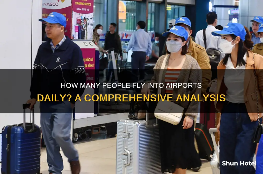 how many people fly into airport