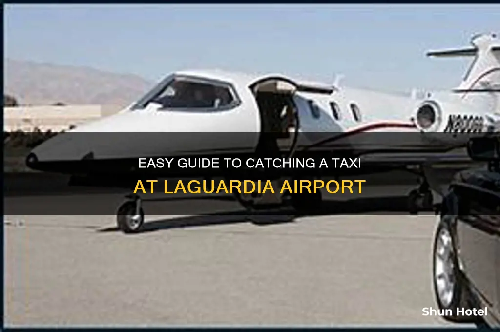 how to get a taxi at laguardia airport