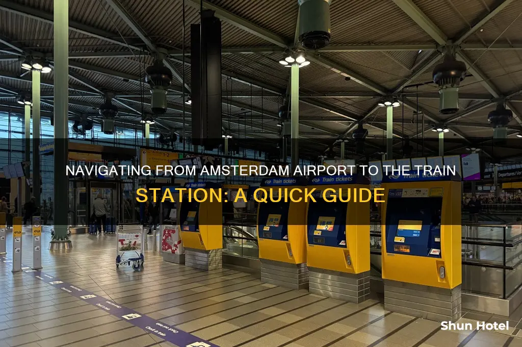 how to get to the train station from amsterdam airport