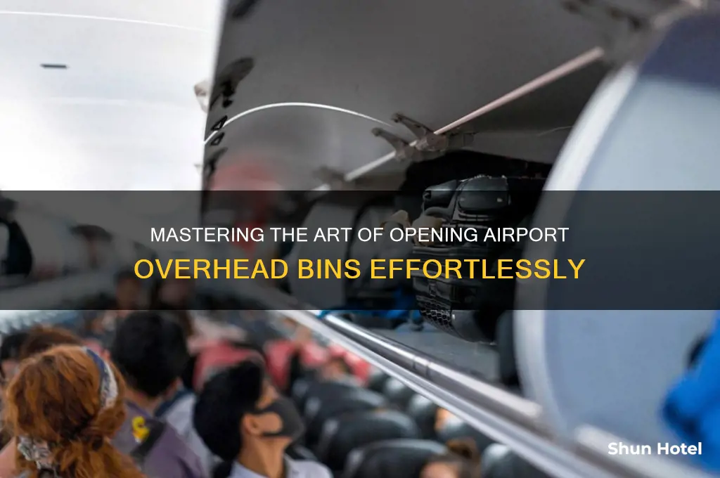 how to open airport overhead bin
