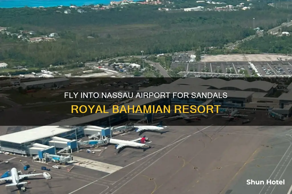 what airport do you fly into for sandals royal bahamian