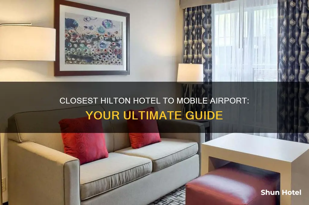 what hilton hotel is closest to mobile airport