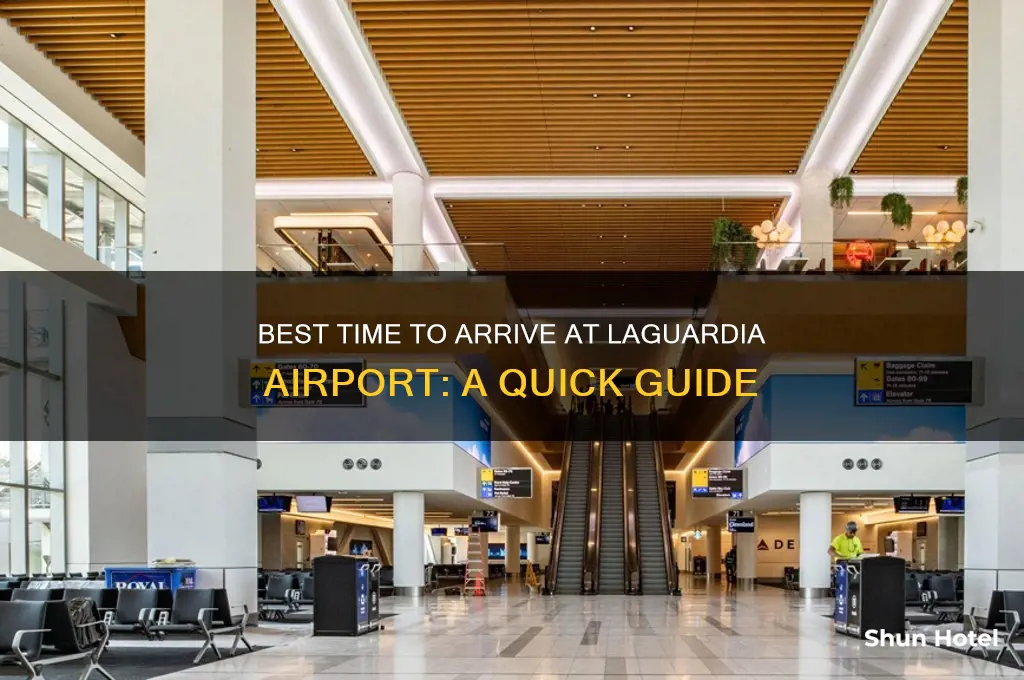 what time should i get to laguardia airport
