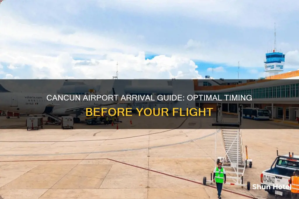 what time to get to cancun airport before flight