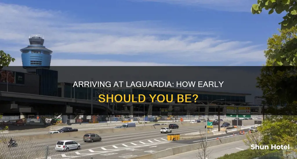 when to arrive at laguardia airport