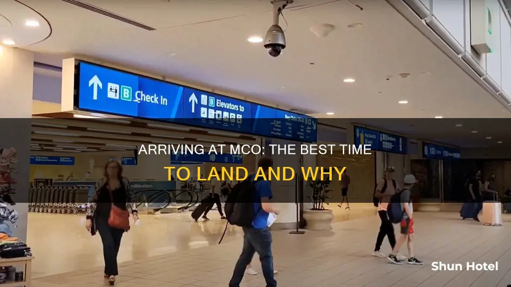 when to arrive at mco airport