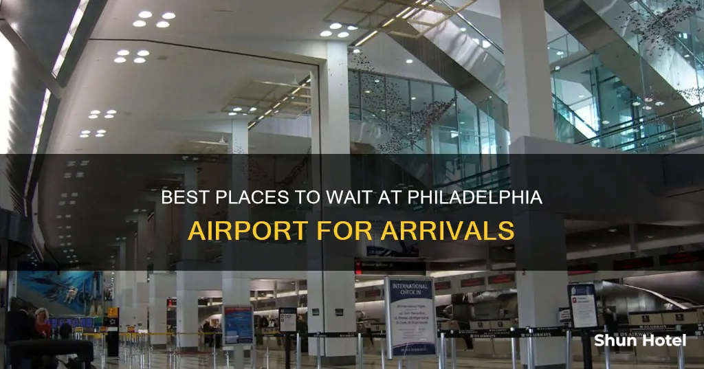 where can i wait philadelphia airport for someone arriving