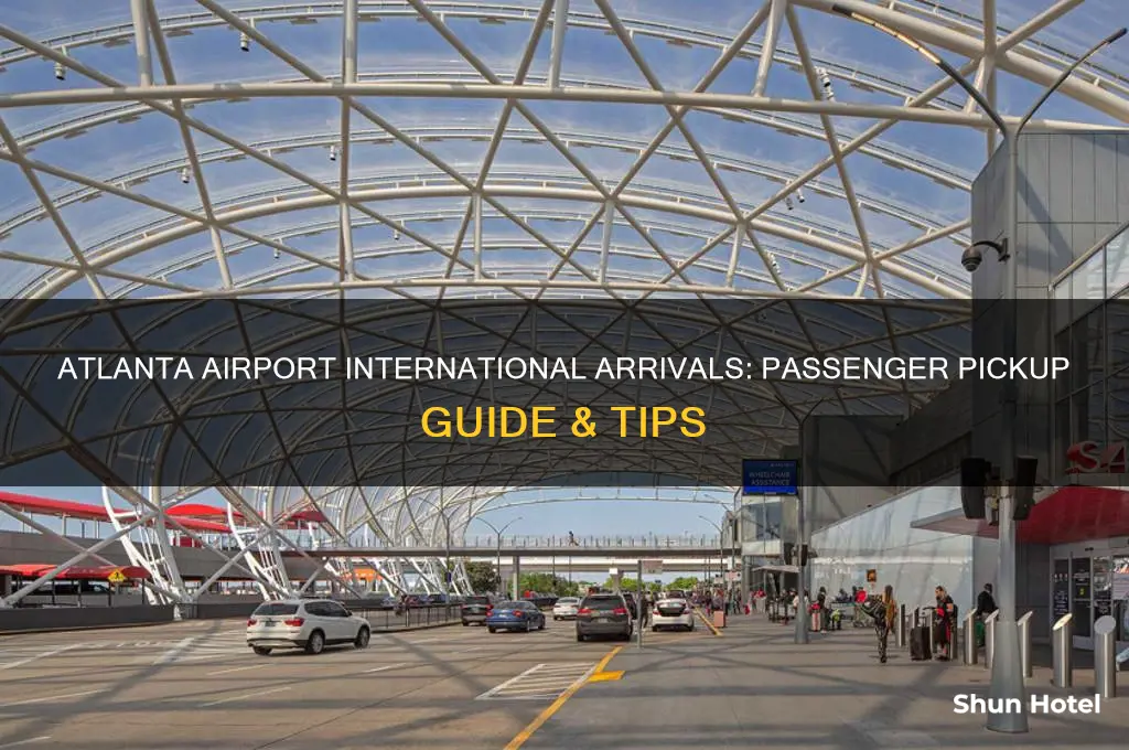 where do you pick up international passengers at atlanta airport