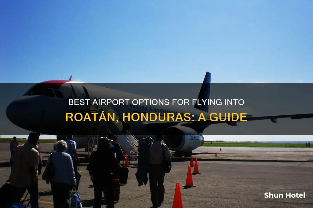 which airport to fly into ruratan honduras