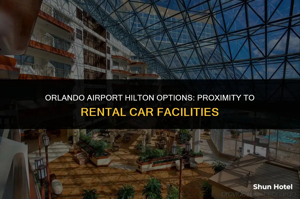 which hilton at orlando airport is closest to rental car