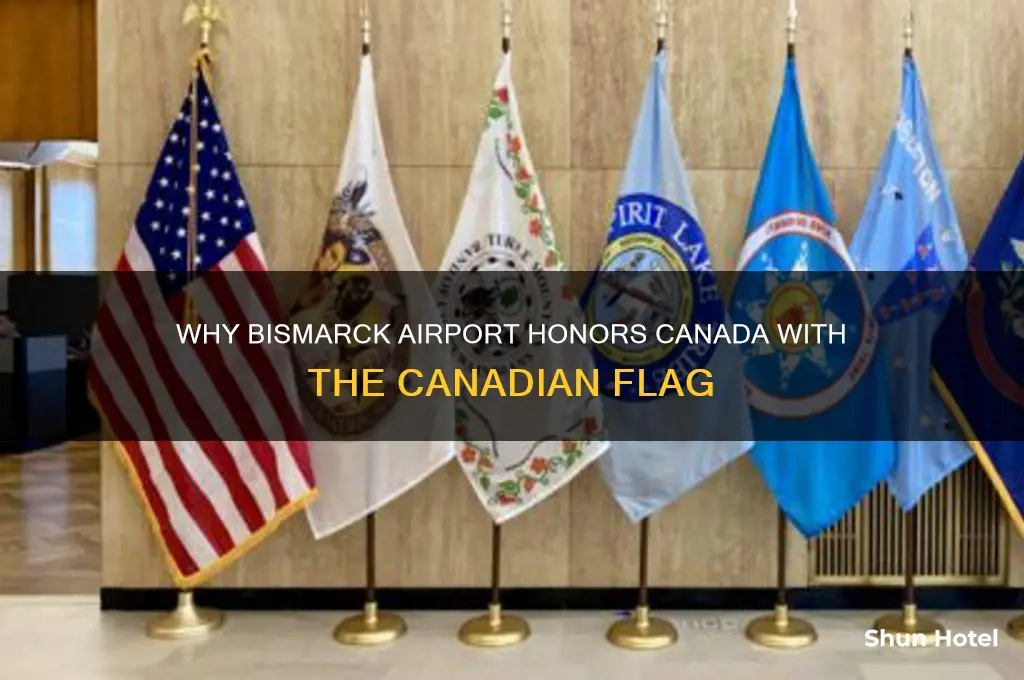 why does bismarck airport fly the canadian flag