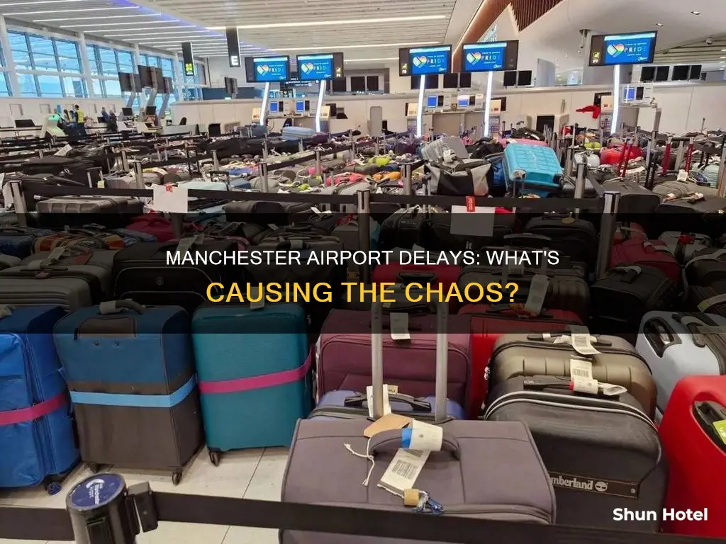 why is manchester airport experiencing delays